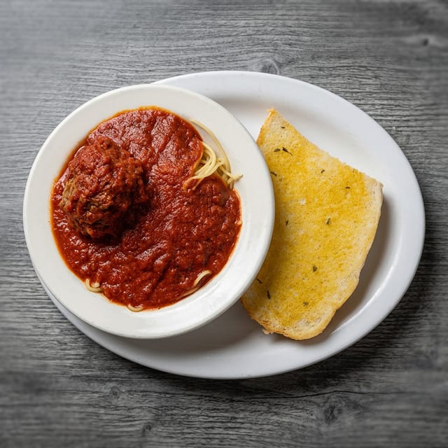 Kids Spaghetti & Meatballs with Garlic Bread.